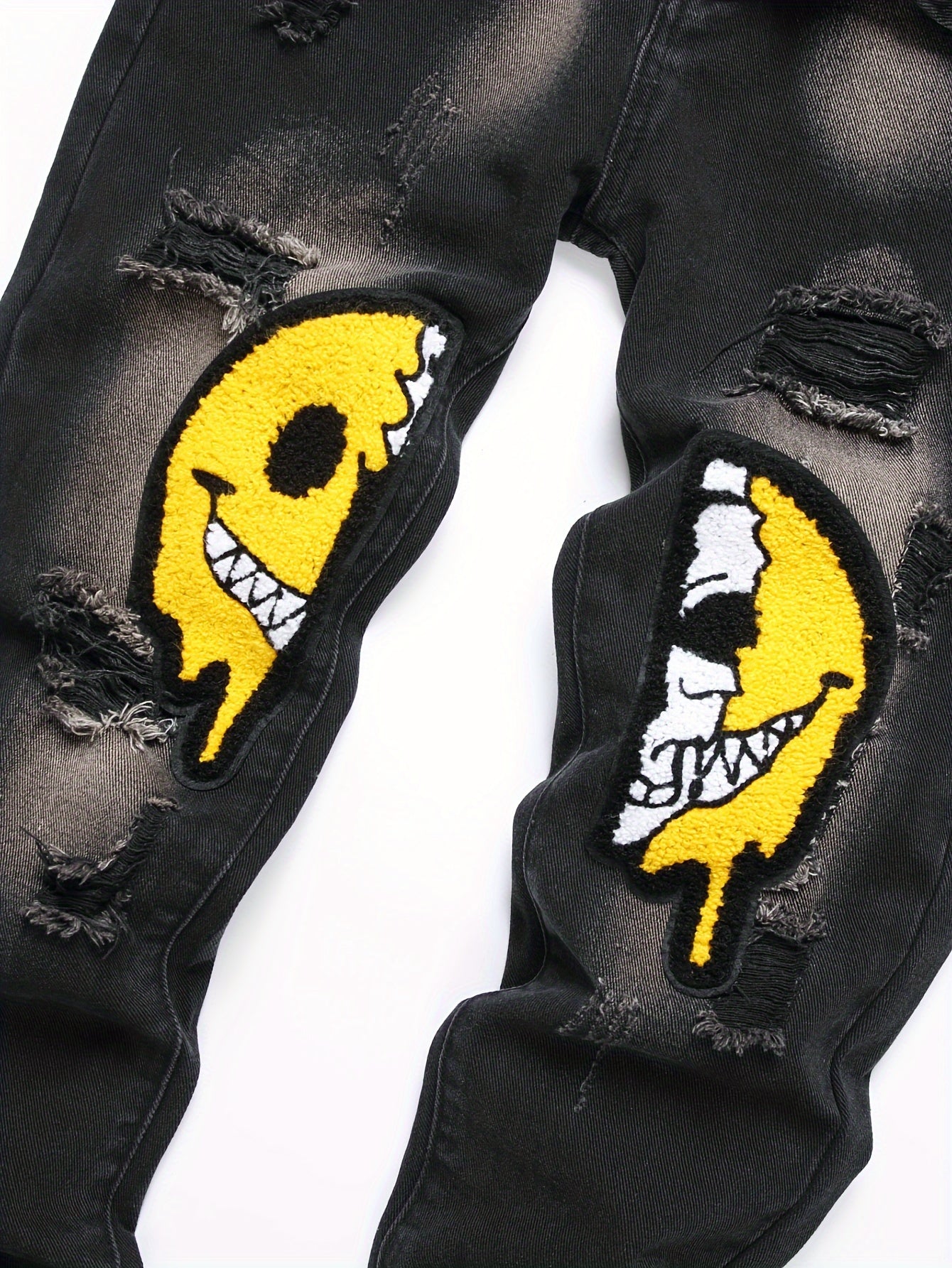 Trendy Boys' Ripped Skull Patched Slim Fit Jeans - Stylish Washed Denim Long Pants with Smile Face Design, Outdoor Kids' Clothing for Active Play